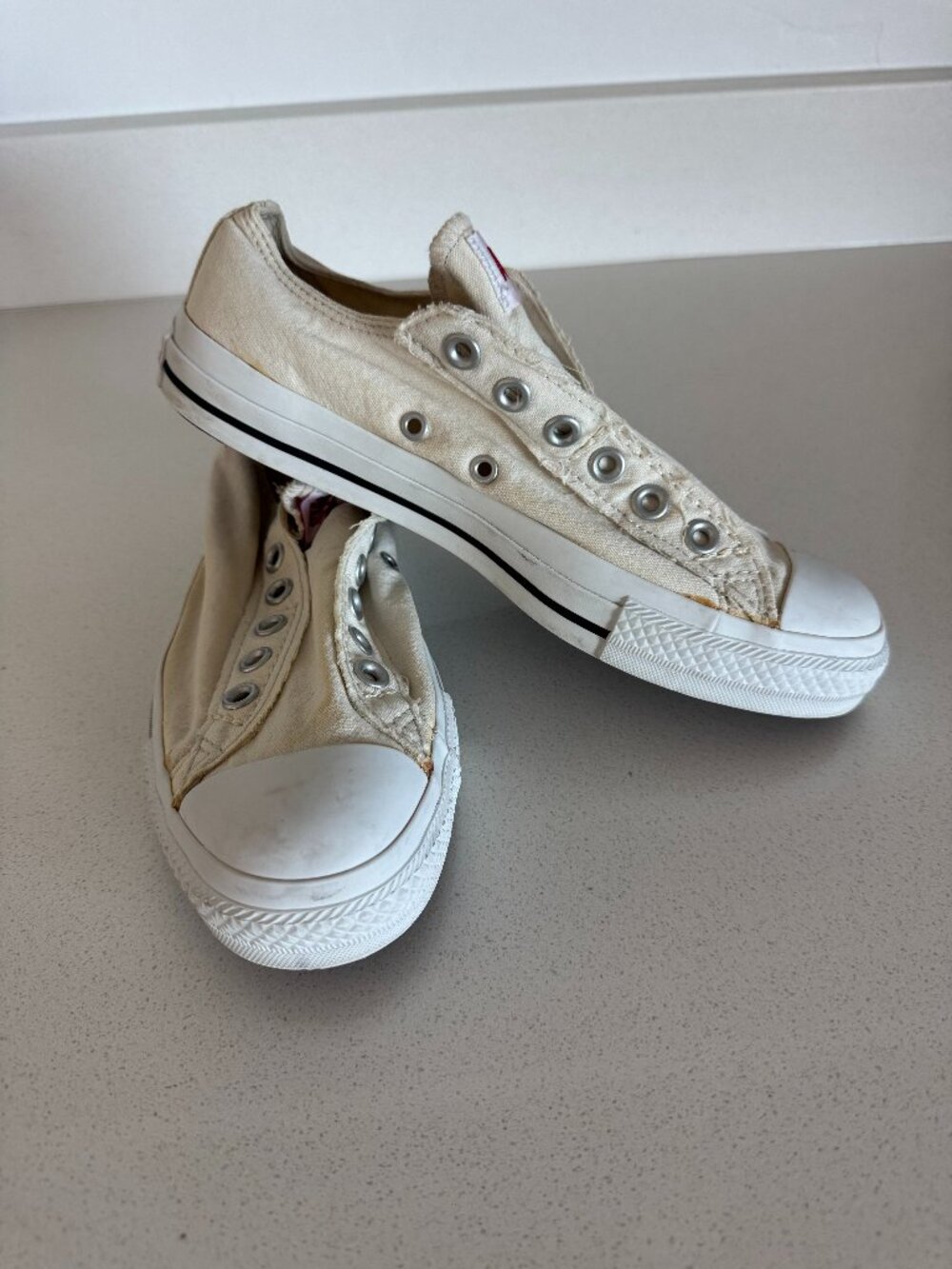 Converse Slip-On Canvas Sneakers In Cream With Red Heal Logo Never worn.